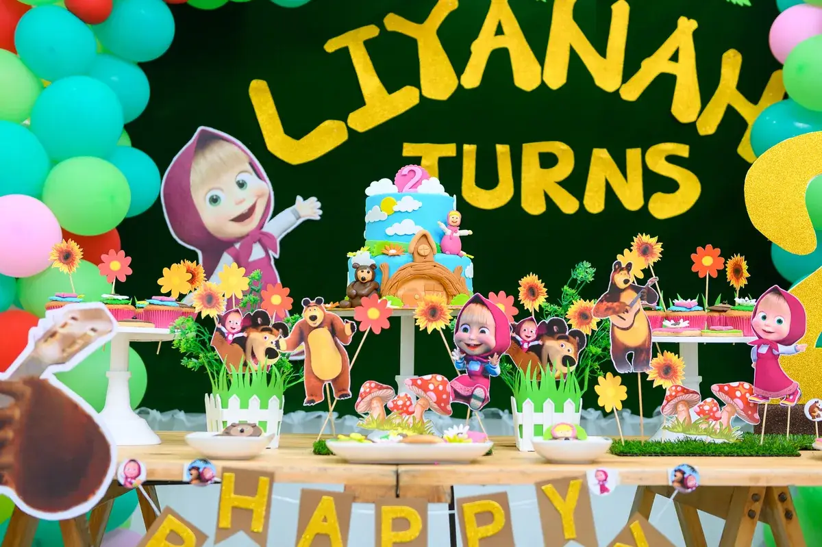 Brightly styled second birthday party table