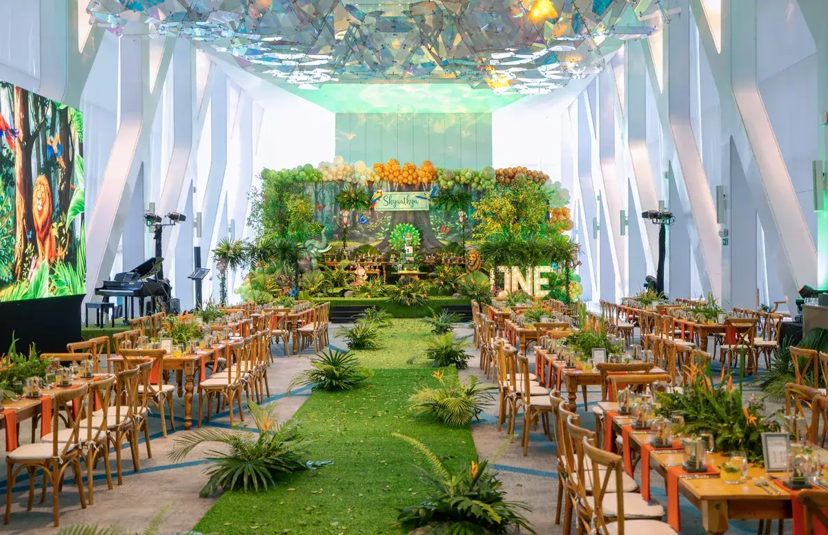Immersive garden-themed event venue decoration