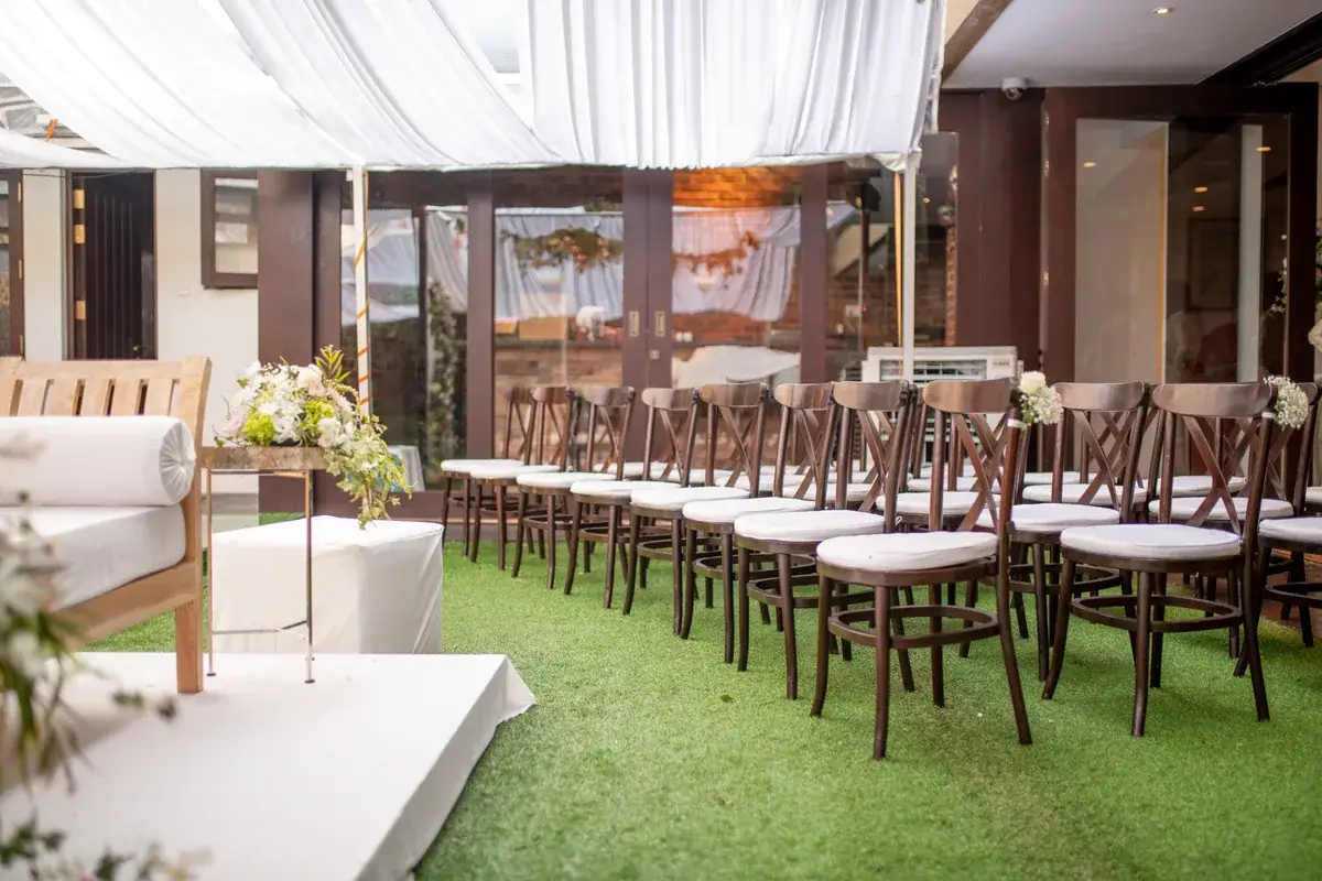 Ceremony seating and floral setting prepared for guests